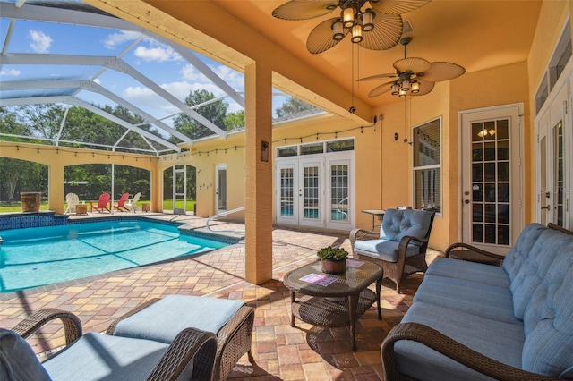 18502 Winding Oaks Blvd, Hudson, FL 34667 - pool featuring an outdoor living space, a ceiling fan, french doors, a lanai, and a patio
