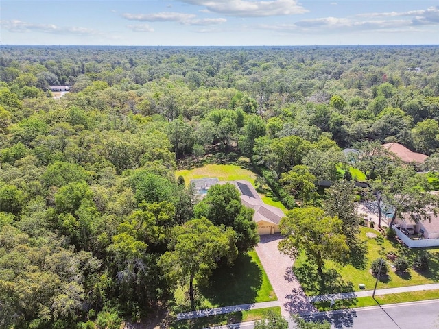 18502 Winding Oaks Blvd, Hudson, FL 34667 - drone / aerial view with a view of trees