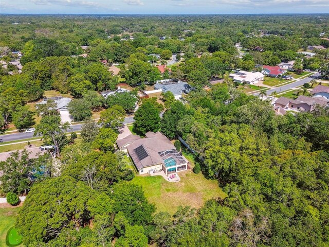 18502 Winding Oaks Blvd, Hudson, FL 34667 - birds eye view of property with a forest view