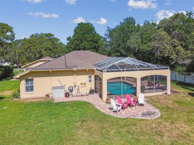 18502 Winding Oaks Blvd, Hudson, FL 34667 - back of property featuring a yard, a patio, an outdoor pool, and stucco siding