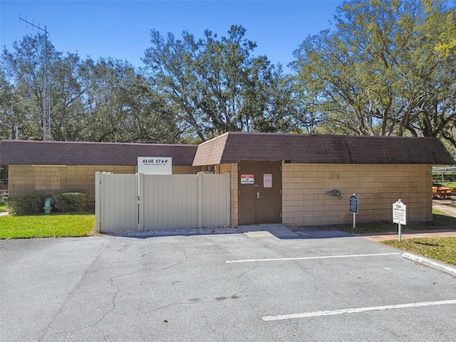 18502 Winding Oaks Blvd, Hudson, FL 34667 - exterior space with fence and uncovered parking