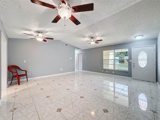 5147 Larch Ln, New Port Richey, FL 34653 - unfurnished living room with visible vents, baseboards, ceiling fan, a textured ceiling, and vaulted ceiling