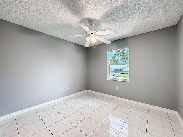 5147 Larch Ln, New Port Richey, FL 34653 - unfurnished room featuring baseboards, a textured ceiling, ceiling fan, and light tile patterned flooring