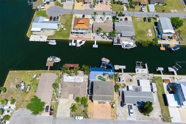 13810 Celida Ave, Hudson, FL 34667 - drone / aerial view featuring a water view and a residential view