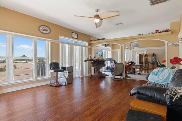 13810 Celida Ave, Hudson, FL 34667 - living room with a ceiling fan, visible vents, and wood finished floors