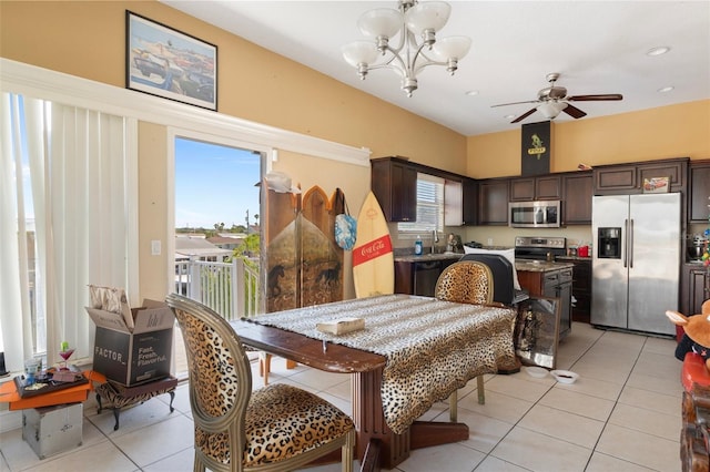 13810 Celida Ave, Hudson, FL 34667 - dining room featuring recessed lighting, light tile patterned floors, and ceiling fan with notable chandelier