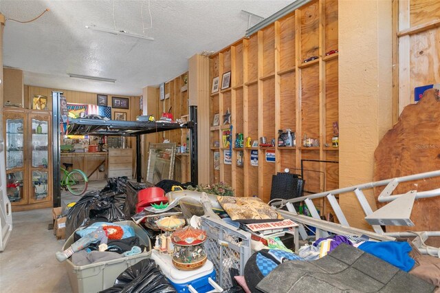 13810 Celida Ave, Hudson, FL 34667 - misc room featuring a textured ceiling and concrete floors