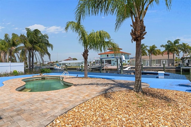 13810 Celida Ave, Hudson, FL 34667 - view of swimming pool with a water view and fence