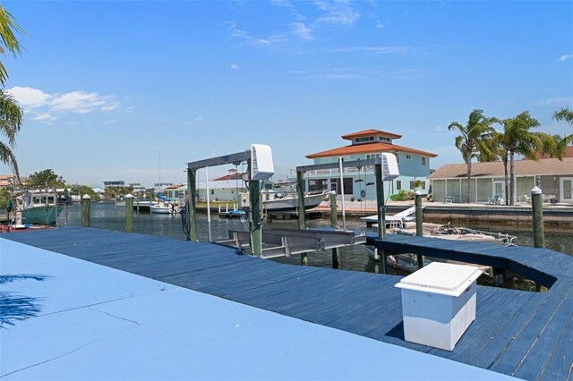 13810 Celida Ave, Hudson, FL 34667 - dock area featuring a water view and boat lift