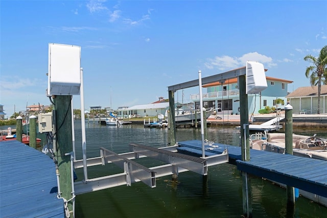 13810 Celida Ave, Hudson, FL 34667 - view of dock featuring a water view and boat lift