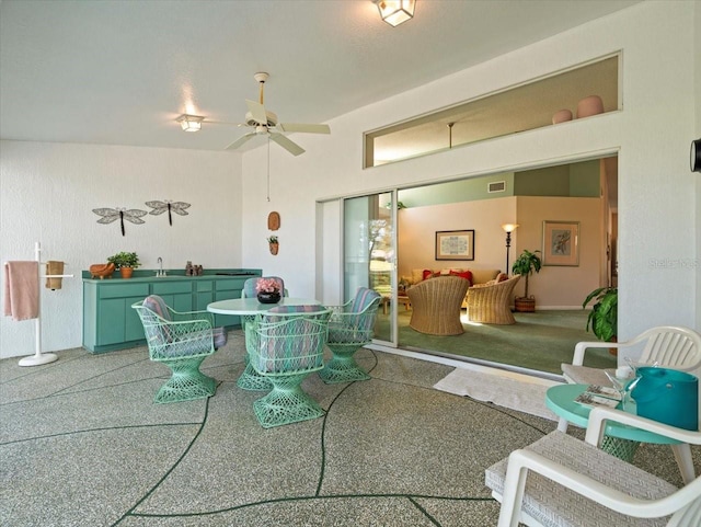 dining area with visible vents and ceiling fan