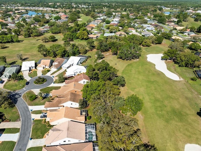 bird's eye view with a residential view, view of golf course, and a water view