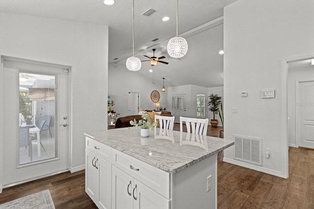 kitchen with a ceiling fan, visible vents, and a healthy amount of sunlight