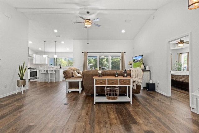 living room featuring high vaulted ceiling, ceiling fan, recessed lighting, and dark wood-style floors