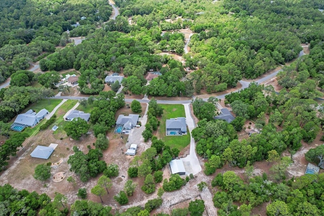 bird's eye view with a forest view
