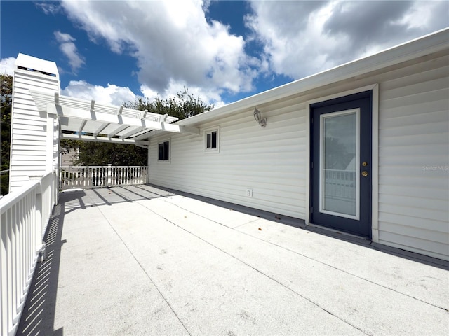 75 N Canal Dr, Palm Harbor, FL 34684 - view of patio featuring a pergola