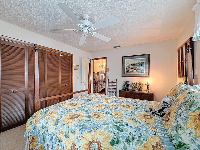 75 N Canal Dr, Palm Harbor, FL 34684 - bedroom with a textured ceiling, visible vents, ceiling fan, and carpet