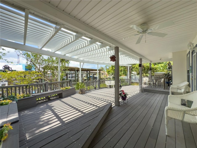75 N Canal Dr, Palm Harbor, FL 34684 - wooden terrace with a pergola, outdoor dining area, and ceiling fan