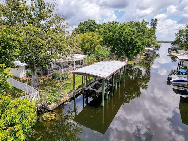 75 N Canal Dr, Palm Harbor, FL 34684 - dock area with a water view and fence