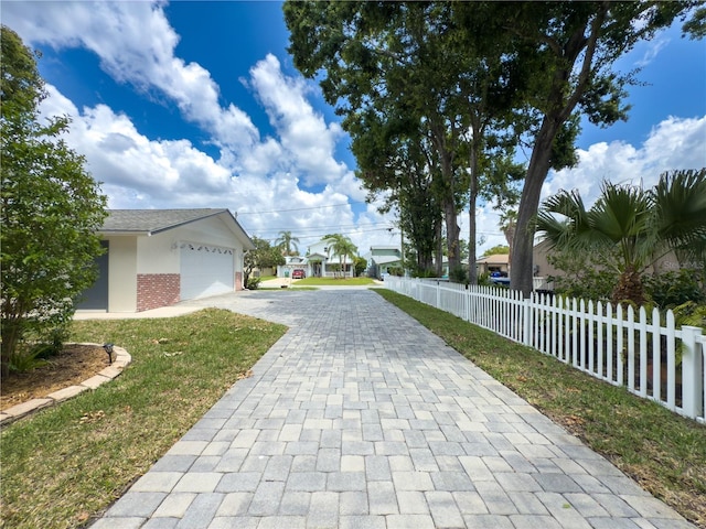 75 N Canal Dr, Palm Harbor, FL 34684 - view of road with decorative driveway