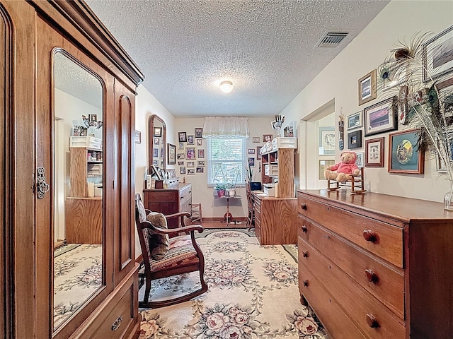 75 N Canal Dr, Palm Harbor, FL 34684 - living area with arched walkways, a textured ceiling, and visible vents