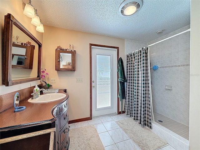 75 N Canal Dr, Palm Harbor, FL 34684 - full bathroom with vanity, a tile shower, and a textured ceiling