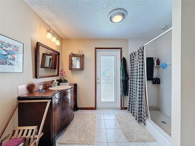 75 N Canal Dr, Palm Harbor, FL 34684 - full bathroom with a textured ceiling, tiled shower, tile patterned flooring, and vanity