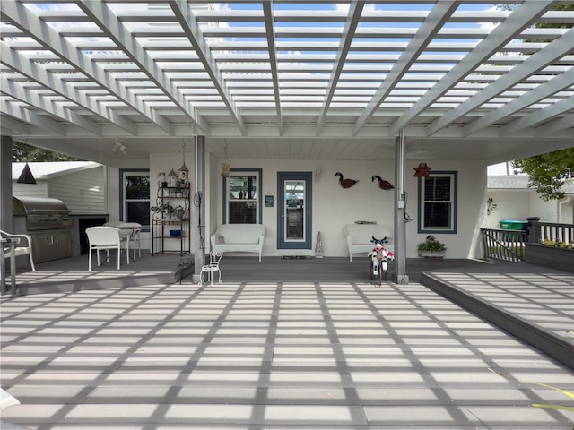 75 N Canal Dr, Palm Harbor, FL 34684 - view of patio featuring a porch, a pergola, and a grill
