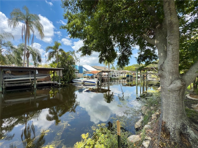75 N Canal Dr, Palm Harbor, FL 34684 - water view featuring boat lift and a dock