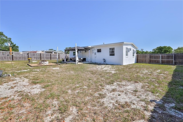 view of yard featuring a patio and a fenced backyard