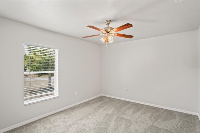 13098 Hanley Dr, Spring Hill, FL 34609 - carpeted spare room featuring a ceiling fan and baseboards