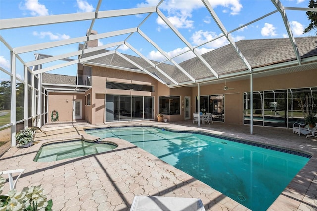 888 Royal Birkdale Dr, Tarpon Springs, FL 34688 - view of pool with a lanai, a patio, a pool with connected hot tub, and a ceiling fan