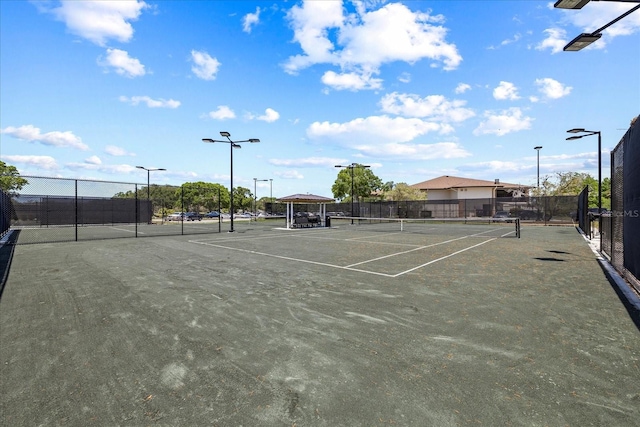 888 Royal Birkdale Dr, Tarpon Springs, FL 34688 - view of tennis court with fence