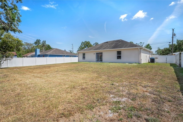 8461 Apple Orchard Rd, Spring Hill, FL 34608 - rear view of property featuring stucco siding and cooling unit