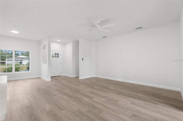 12331 Fulmar Rd, Weeki Wachee, FL 34614 - spare room featuring light wood-style floors, a ceiling fan, and recessed lighting