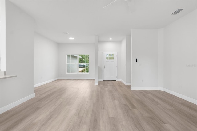 12331 Fulmar Rd, Weeki Wachee, FL 34614 - spare room with light wood finished floors, a ceiling fan, and recessed lighting