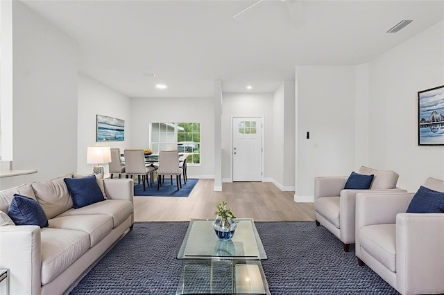 12331 Fulmar Rd, Weeki Wachee, FL 34614 - living area with light wood-style floors and recessed lighting