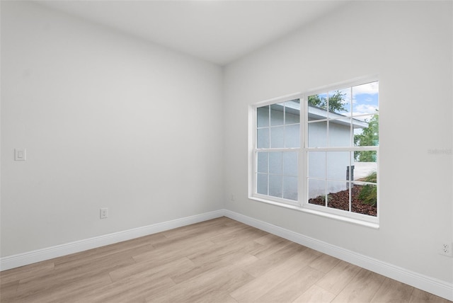 12331 Fulmar Rd, Weeki Wachee, FL 34614 - unfurnished room featuring light wood-style floors and baseboards
