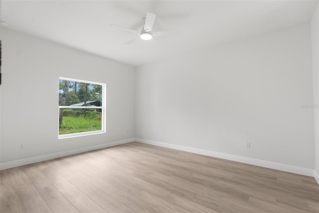12331 Fulmar Rd, Weeki Wachee, FL 34614 - unfurnished room with light wood-style floors and ceiling fan