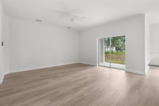 12331 Fulmar Rd, Weeki Wachee, FL 34614 - empty room with ceiling fan and light wood-style floors