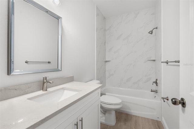 12331 Fulmar Rd, Weeki Wachee, FL 34614 - full bath featuring vanity, wood finished floors, and shower / washtub combination