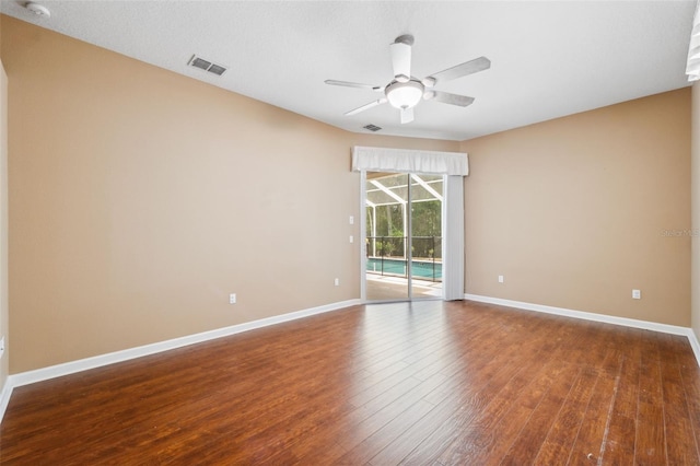 4080 Gevalia Dr, Brooksville, FL 34604 - unfurnished room with wood-type flooring, ceiling fan, visible vents, and baseboards