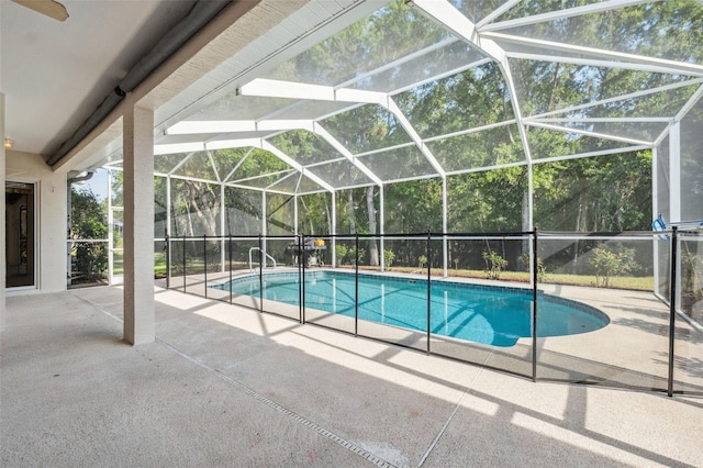 4080 Gevalia Dr, Brooksville, FL 34604 - outdoor pool featuring glass enclosure and a patio area