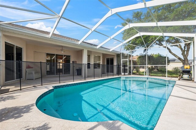 4080 Gevalia Dr, Brooksville, FL 34604 - pool with a ceiling fan, a patio, and glass enclosure