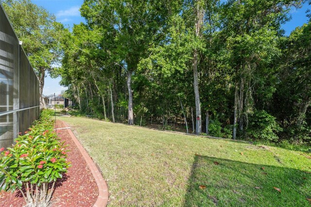 4080 Gevalia Dr, Brooksville, FL 34604 - view of yard with a lanai