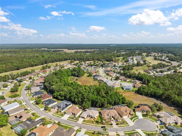 4080 Gevalia Dr, Brooksville, FL 34604 - drone / aerial view featuring a wooded view and a residential view