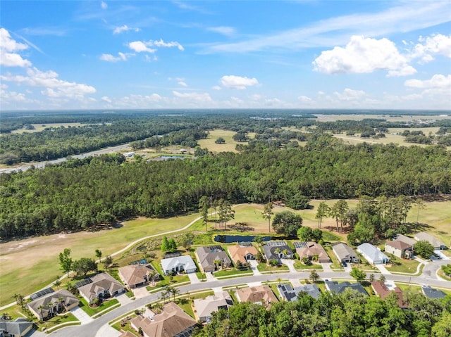 4080 Gevalia Dr, Brooksville, FL 34604 - drone / aerial view with golf course view, a residential view, and a forest view