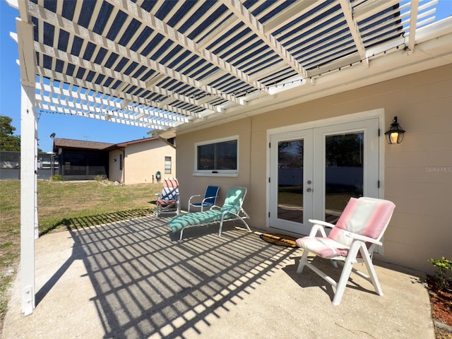view of patio / terrace with a pergola and french doors