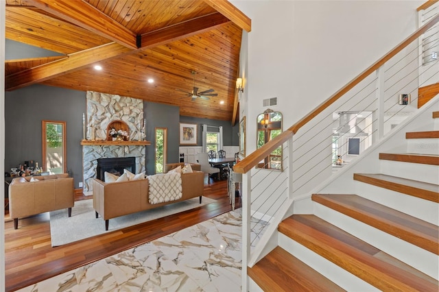520 Lafayette Blvd, Oldsmar, FL 34677 - living room featuring stairs, visible vents, wood ceiling, and high vaulted ceiling