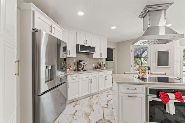 520 Lafayette Blvd, Oldsmar, FL 34677 - kitchen with recessed lighting, marble finish floor, wall chimney exhaust hood, decorative backsplash, and stainless steel appliances